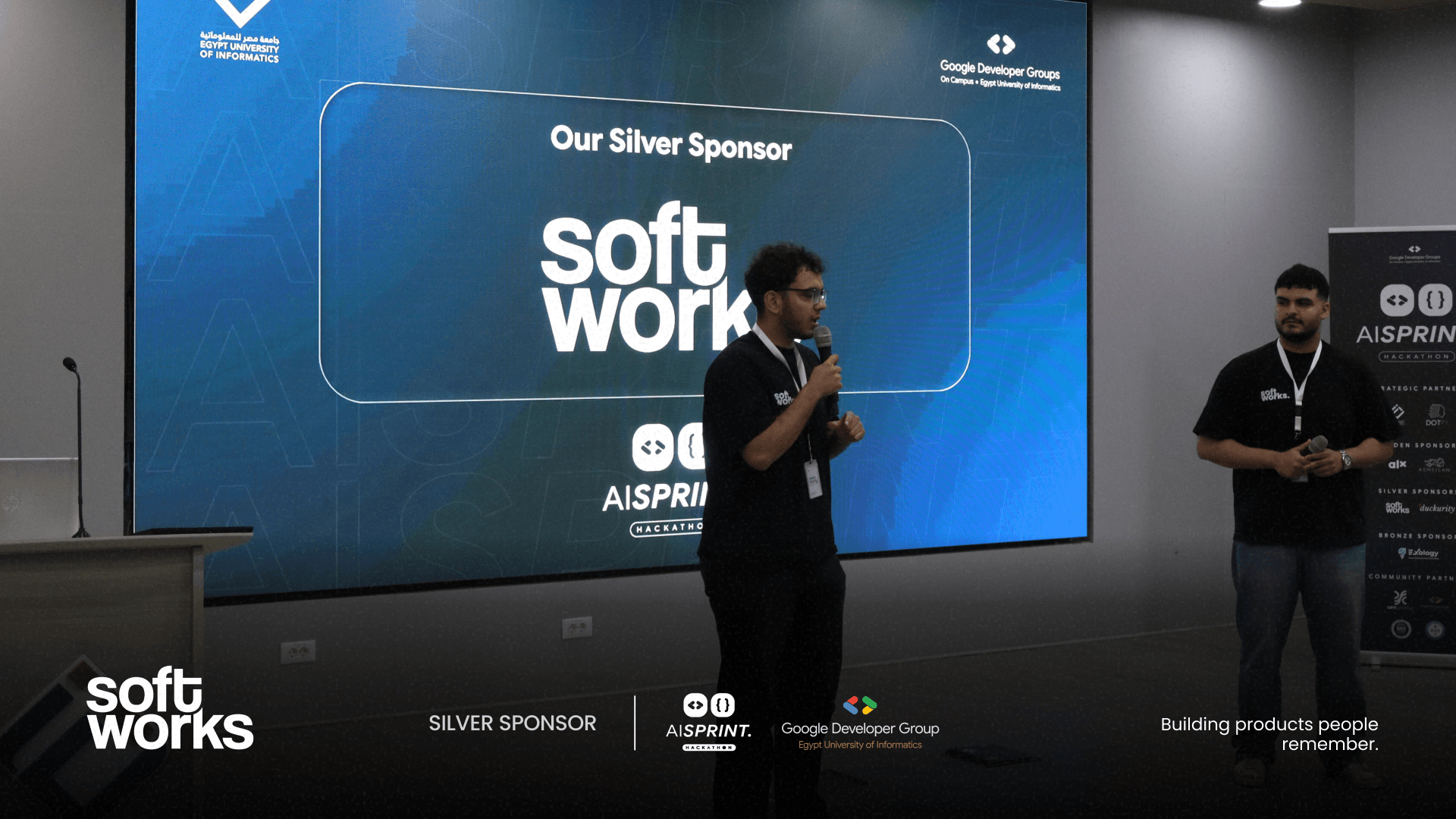 Softworks speaking on stage as AI Sprint's silver sponsor