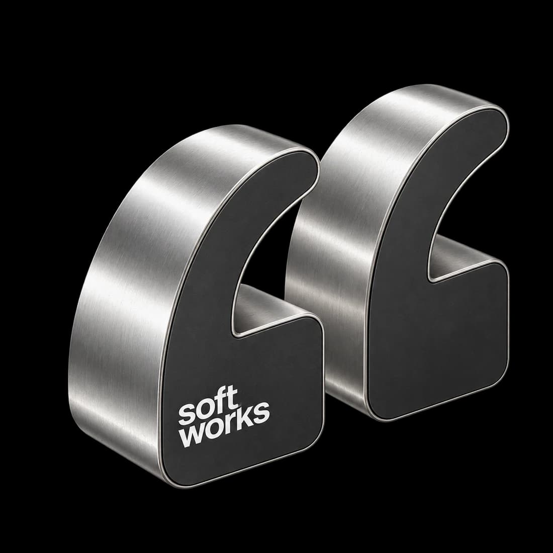 Two sculptural silver quotation marks with graphite faces and the Softworks wordmark.